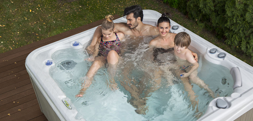 family in a hot tub