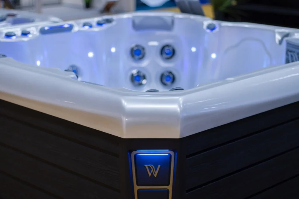 How to Find Local Hot Tub Dealers You Can Trust 1 Picture of a Wellis hot tub at a local hot tub dealers store.