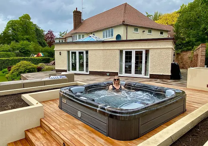 13 Hot Tub Deck Ideas For Inspiration 2 Partially inground hot tub deck idea.