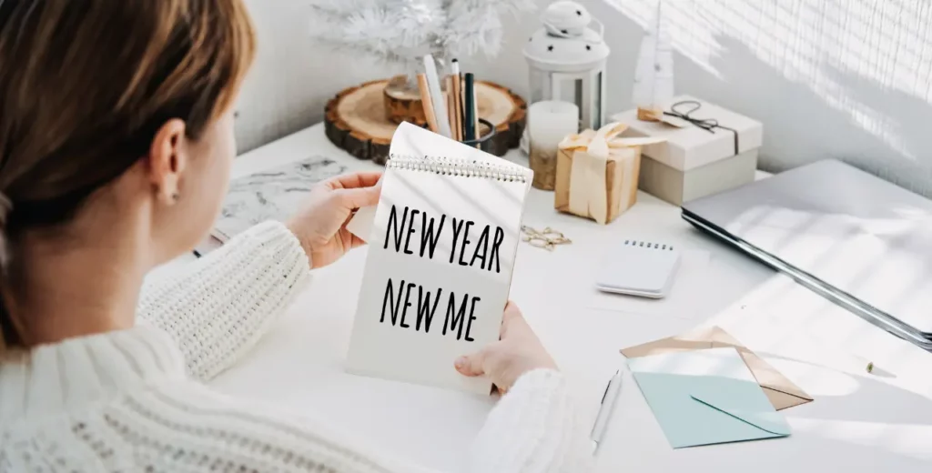 Top 3 New Year Resolutions in 2024 1 Picture of a woman reviewing the top New Year Resolutions.