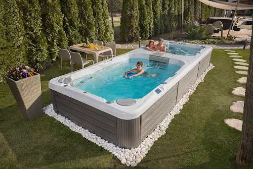 Why is the Price of a Swim Spa Different Than the Price of a Hot Tub? 1 family in a swim spa price
