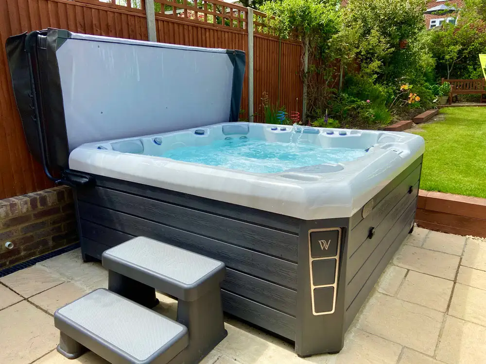 Hot tub cover and hot tub steps as some of the best accessories for a hot tub.