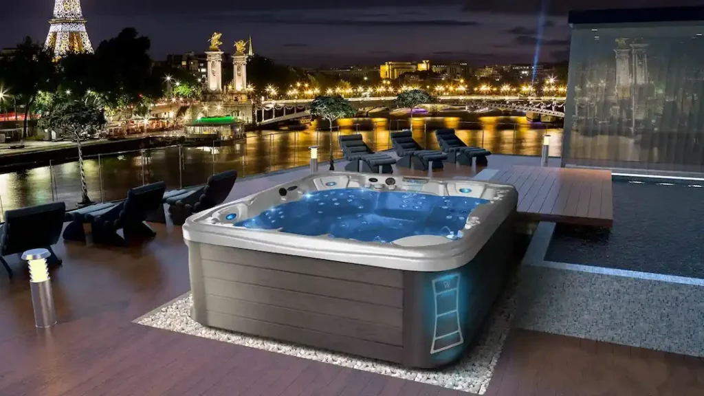 Picture of a hot tub overlooking a city ready for a hot tub party.